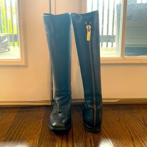 Black Stewart Weitman boots. Gold back zipper. Size 35. Worn only a few times